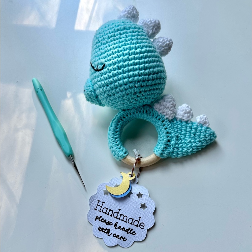 Crochet baby rattle dinosaur plush toy green